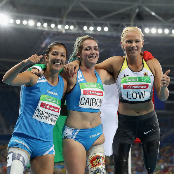 Silver medalist Vanessa Low of Germany, gold medalist Martina Caironi of Italy and bronze medalist Monica Graziana Contrafatto of Italy celebrate after completing the Women's 100m - T42 Final during Day 10 of the Rio 2016 Paralympic Games at the Olympic Stadium on September 17, 2016 in Rio de Janeiro, Brazil