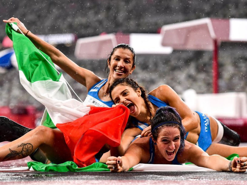 Bronze medalist Monica Graziana Contrafatto of Team Italy, gold medalist Ambra Sabatini of Team Italy and silver medalist Martina Caironi of Team Italy celebrate after competing in the Women's 100m - T63 Final on day 11 of the Tokyo 2020 Paralympic Games at Olympic Stadium on September 04, 2021 in Tokyo, Japan