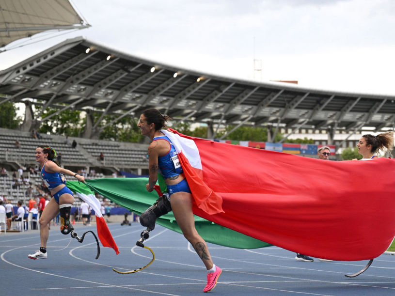 Martina Caironi of Italy, Ambra Sabatini of Italy and Monica Graziana Contrafatto of Italy celebrate after the Women's 100m T63 Final during day six of the Para Athletics World Championships Paris 2023 at Stade Charlety on July 13, 2023 in Paris, France.